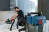 BOSCH 06019C6302 GAS 18V-10 L aspirator cu acumulator görgőkkel (acumulator și fără încărcător)