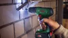 BOSCH 06039D8002 Easydrill 18V-40 Cu acumulator fúróșurubelniță (2x 1,5Ah) + AL18V-20